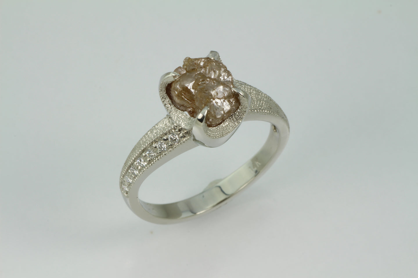 Natural colored diamond crystal and cut diamond engagement ring